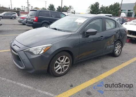 2018 Toyota Yaris Ia из США, поврежденный, VIN 3MYDLBYV6JY329573